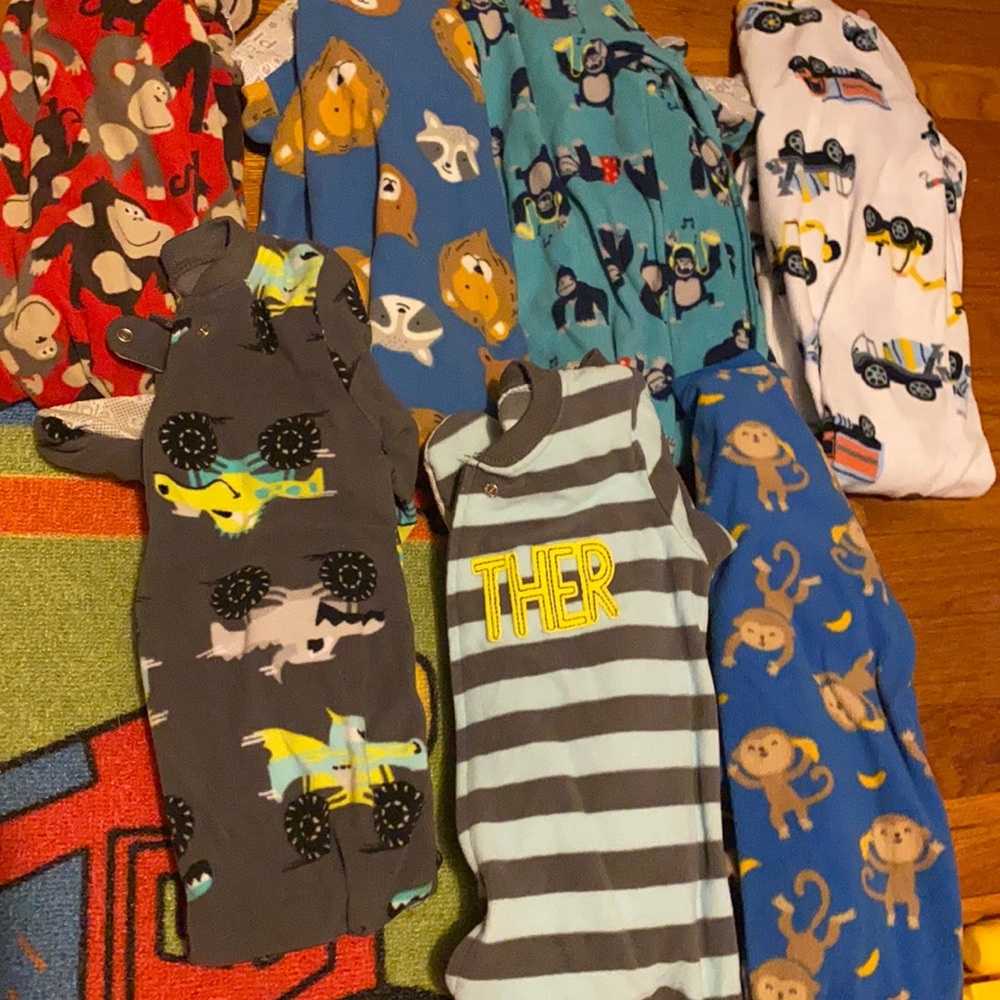 7 pairs of fleece footed pjs